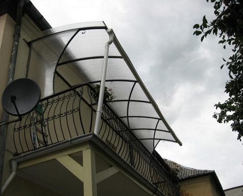Козырек на балкон своими руками: виды, материалы изготовления, монтаж