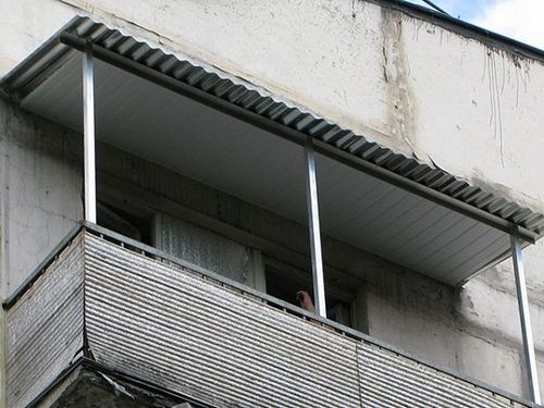 Козырек на балкон своими руками: виды, материалы изготовления, монтаж